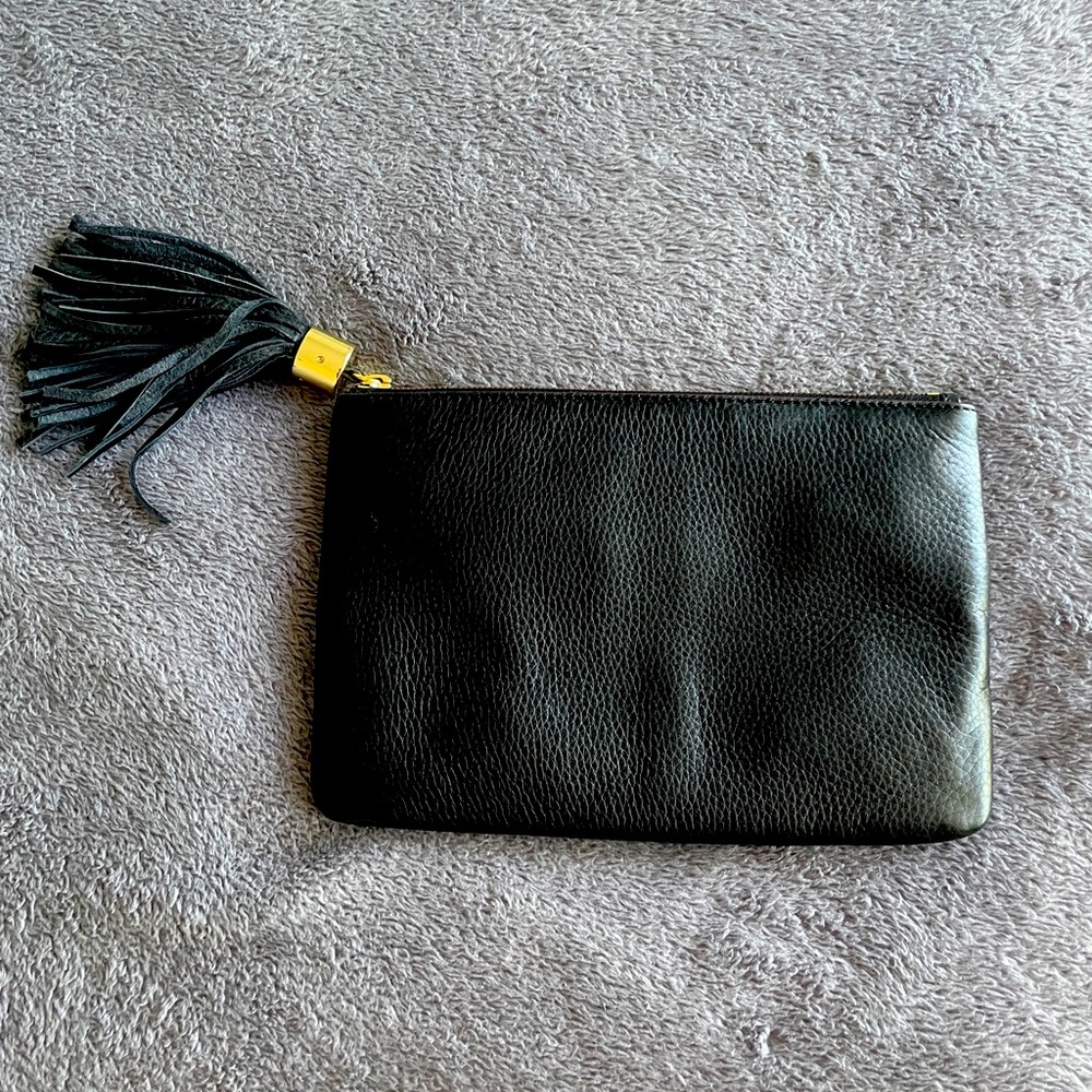 G.I.L.I. black leather clutch/pouch with yellow gold hardware.